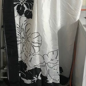 Black and white flowered standard shower curtain.